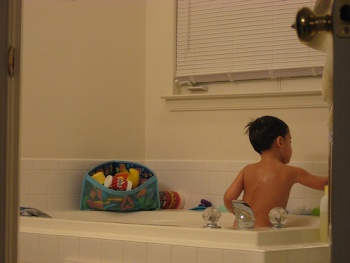 Picking up bath toys Picking up bath toys